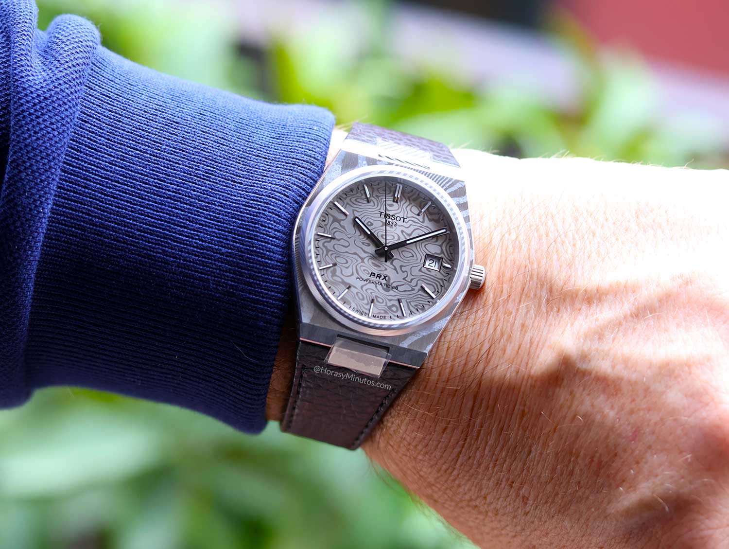 En la muñeca: Tissot PRX 38 mm acero damasco